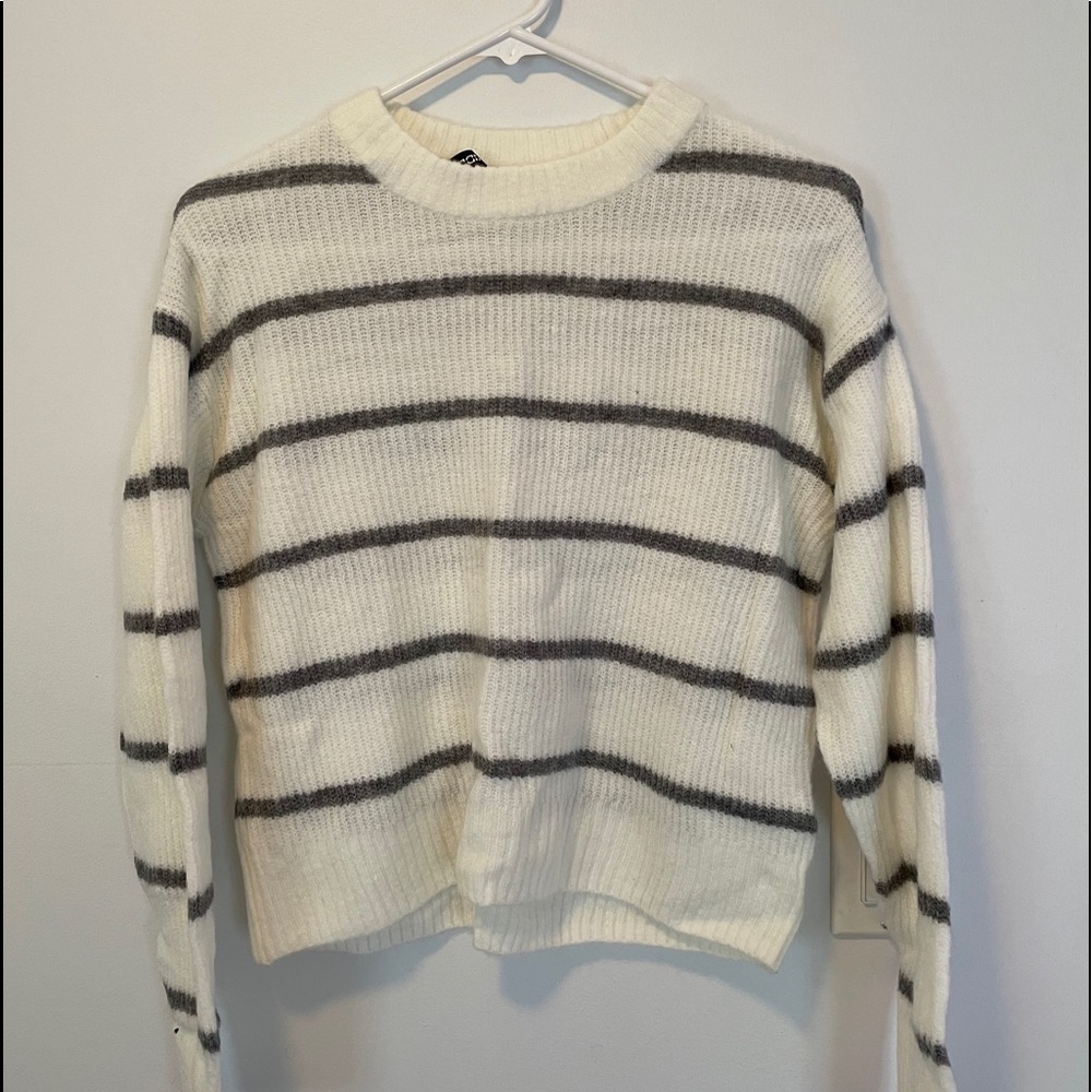 Striped long sleeve sweater.